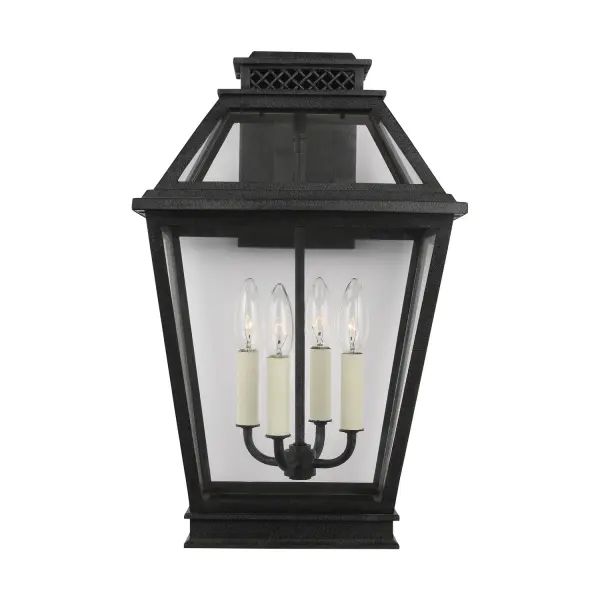 The Falmouth outdoor wall lantern by Chapman & Myers brings vintage charm to exterior spaces with its tapered box silhouette and clear glass panels. Wet-rated for all weather conditions and Title 24 compliant.