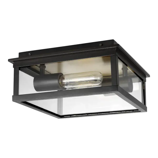The Freeport flush mount by Chapman & Myers delivers modern sophistication for outdoor spaces with its clean-lined rectangular silhouette and heritage copper finish. Compact at 10.5" square, it's ideal for covered porches and entryways.
