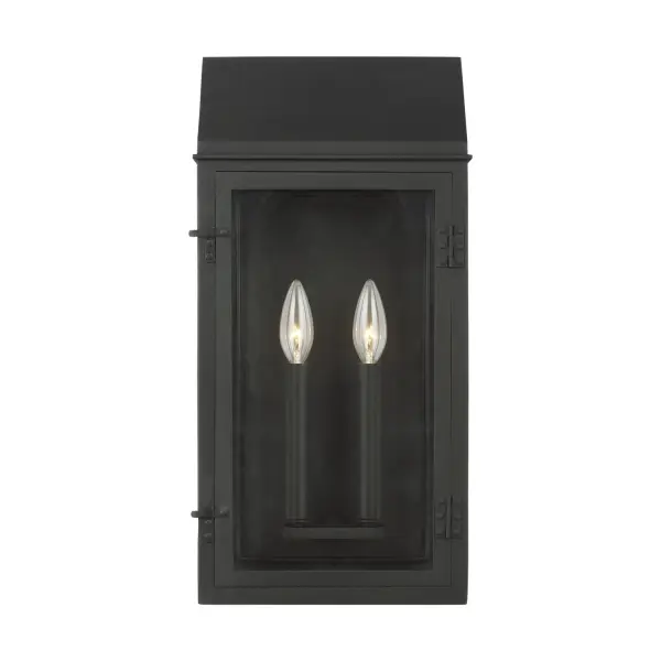 The Hingham outdoor wall lantern combines traditional lantern styling with modern durability. Its textured black finish and clear glass front create timeless curb appeal while the wet-rated construction ensures reliable performance in all weather conditions.
