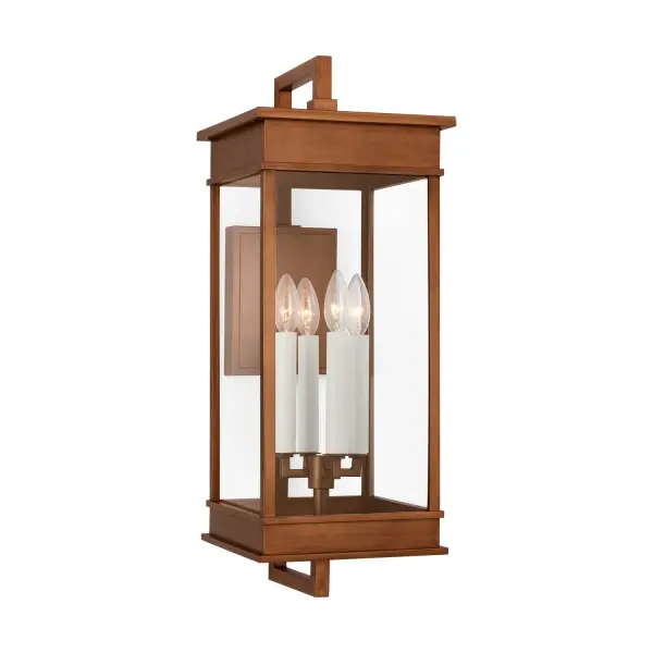 The Cupertino wall lantern by Chapman & Myers combines traditional candelabra styling with transitional rectangular form. Natural copper finish and stepped architectural details create timeless curb appeal.
