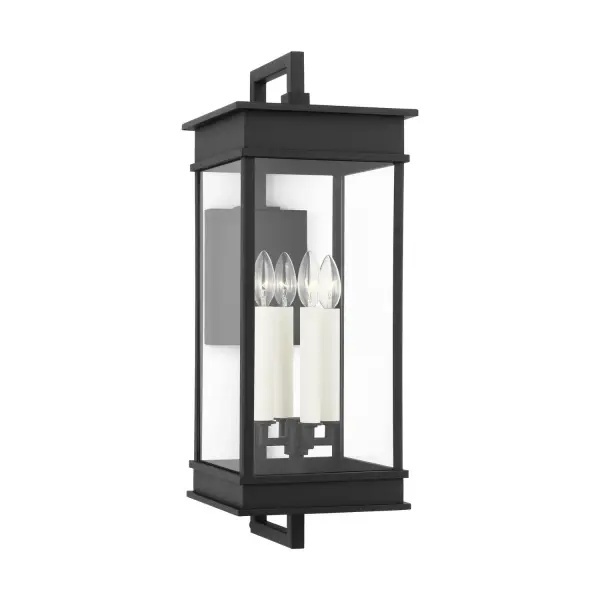 The Cupertino outdoor wall sconce by Chapman & Myers combines transitional elegance with practical outdoor durability. Its rectangular lantern profile features stepped architectural detailing and a traditional candelabra design with cream candle tubes.