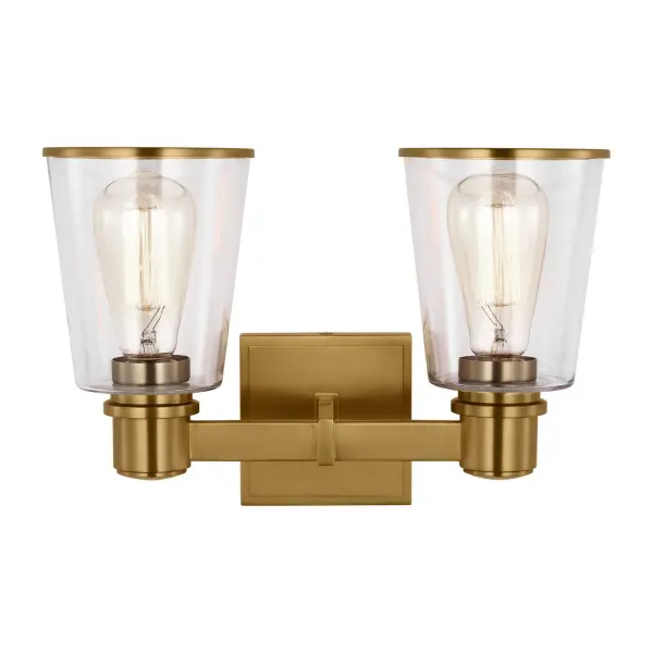 The Alessa vanity light combines simple geometric forms with quality materials. Burnished brass arms support tapered clear glass shades that showcase vintage-style bulbs. Compact sizing works well in smaller bathrooms.