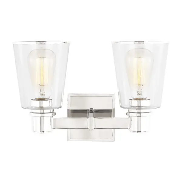 Chapman & Myers designed this refined two-light fixture that pairs rectangular metal arms with tapered clear glass shades. The conical glass frames vintage-style filament bulbs beautifully while the polished nickel finish adds timeless elegance.