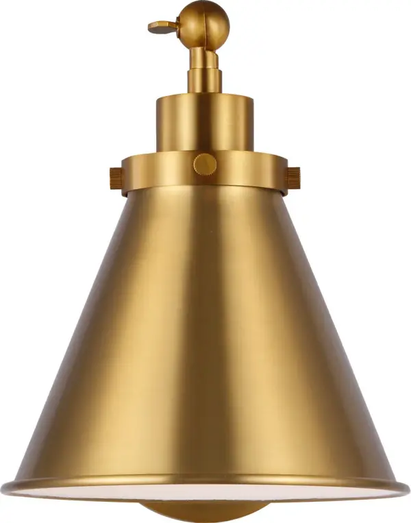 The Wellfleet sconce by Chapman & Myers brings authentic utility lighting style to modern spaces. Its burnished brass finish and midnight black dome shade create striking contrast, while the compact profile works beautifully in tight spaces.