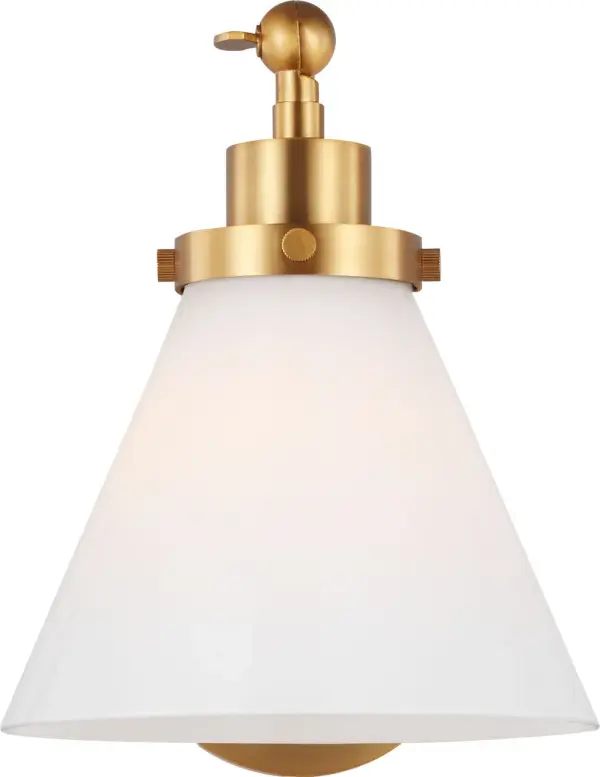 The Wellfleet sconce by Chapman & Myers blends industrial and farmhouse aesthetics with a milk glass dome shade and burnished brass hardware. Its compact 7.25" width makes it ideal for flanking mirrors or lining hallways.