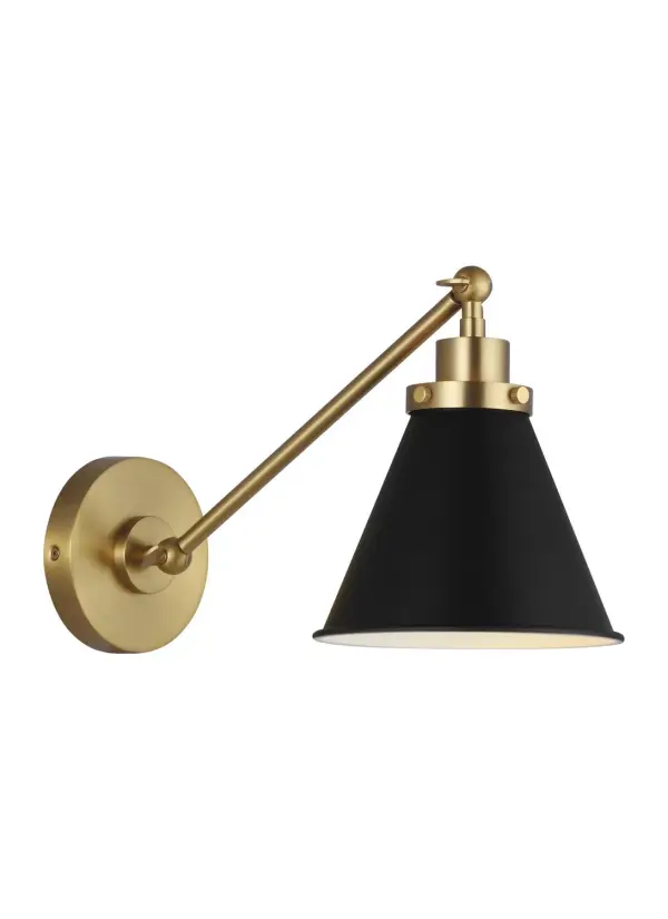 The Wellfleet sconce by Chapman & Myers blends classic utility design with refined finishes. The midnight black dome shade paired with burnished brass hardware creates visual interest while maintaining versatility across traditional and modern spaces.