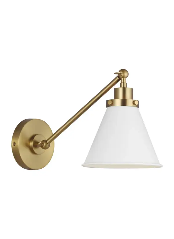 The Wellfleet sconce by Chapman & Myers blends industrial heritage with contemporary finishes. Its matte white dome shade and burnished brass hardware create a versatile fixture that works in both traditional and modern spaces.