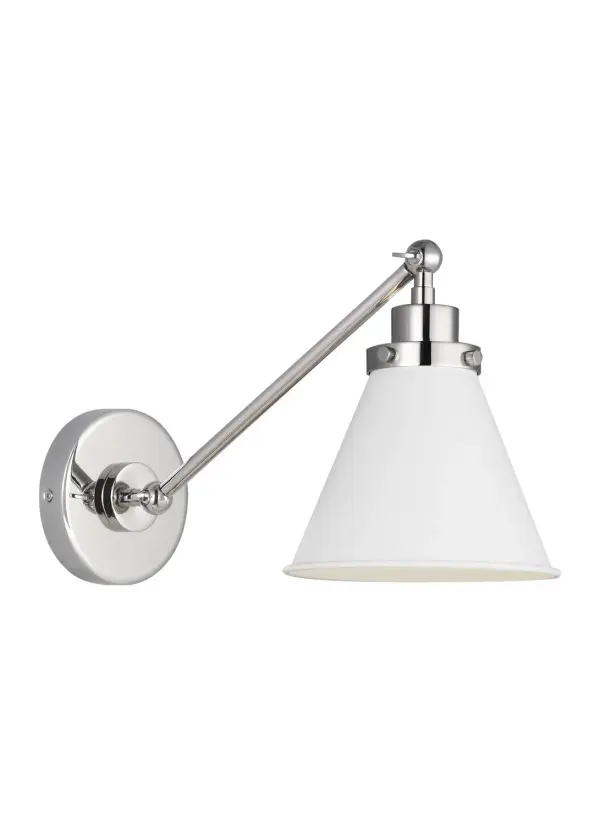 The Wellfleet sconce by Chapman & Myers blends industrial factory styling with farmhouse charm. Its matte white dome shade and polished nickel hardware create a versatile fixture that works in traditional and contemporary spaces alike.