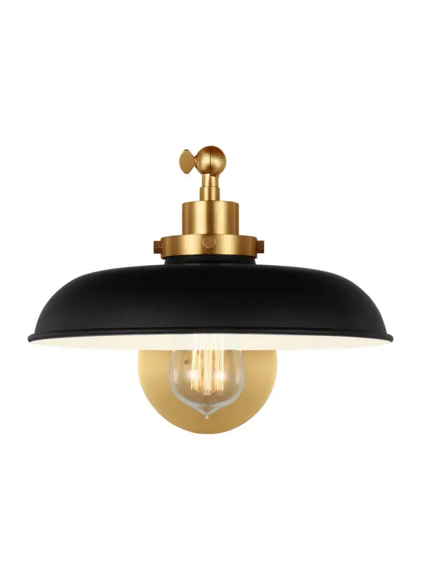 The Wellfleet sconce blends factory lighting heritage with modern farmhouse appeal. Its midnight black dome shade paired with burnished brass accents creates visual interest while the 17.75-inch extension provides ample task lighting.