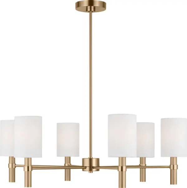 The Manor Large Chandelier combines modern minimalism with transitional elegance through six white linen drum shades and a clean linear frame. Its Satin Brass finish adds warmth while the damp rating ensures versatility.