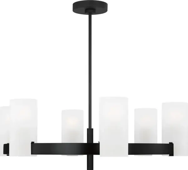 The Rhode Large Chandelier delivers sophisticated illumination through eight etched glass shades in a clean, modern silhouette. Its Midnight Black finish adds dramatic contrast while the diffused lighting creates warm ambiance.
