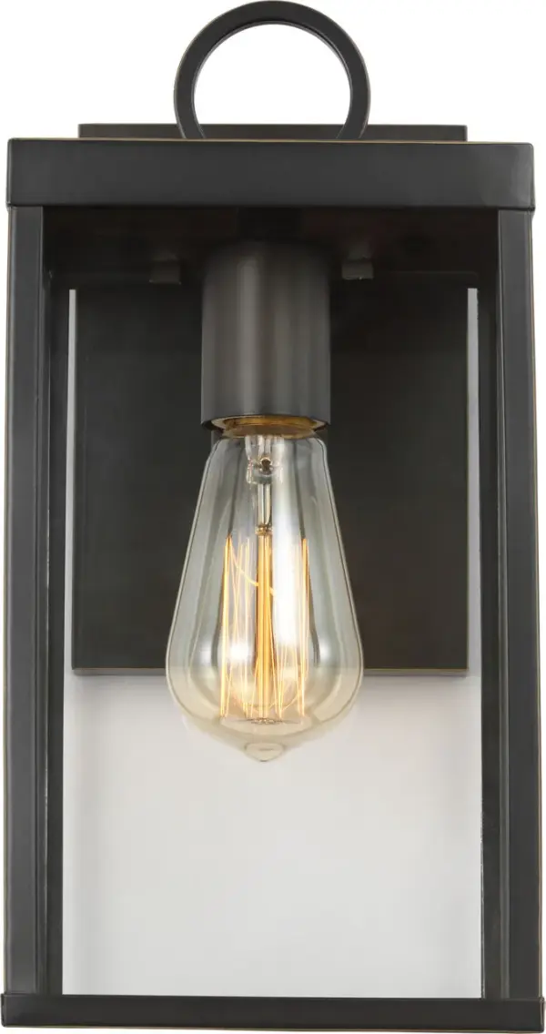 The Howell Small Wall Lantern blends timeless design with weather-resistant construction. Its soft white glass panels create a warm, inviting glow perfect for entryways and outdoor living spaces.