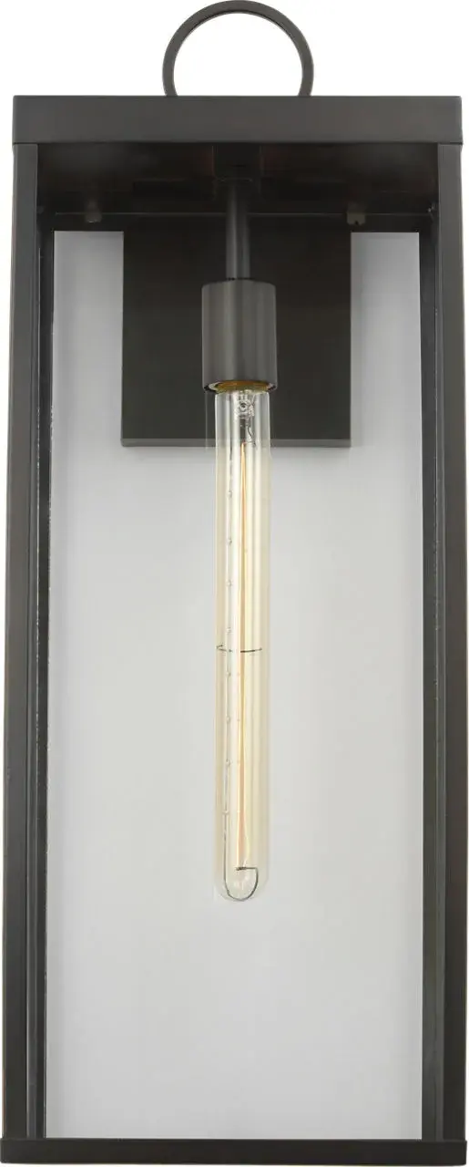 The Howell Extra Large Wall Lantern combines architectural elegance with practical outdoor lighting. Its elongated silhouette and soft white glass panels create a warm, welcoming glow perfect for grand entryways and expansive patios.