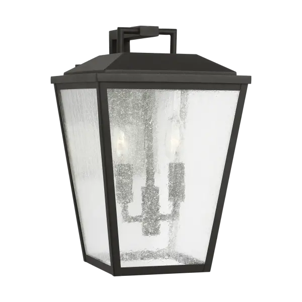 The Kennewick Medium Wall Lantern combines traditional lantern styling with a contemporary textured black finish. Its clear glass panels provide excellent illumination while the durable construction ensures long-lasting outdoor performance.