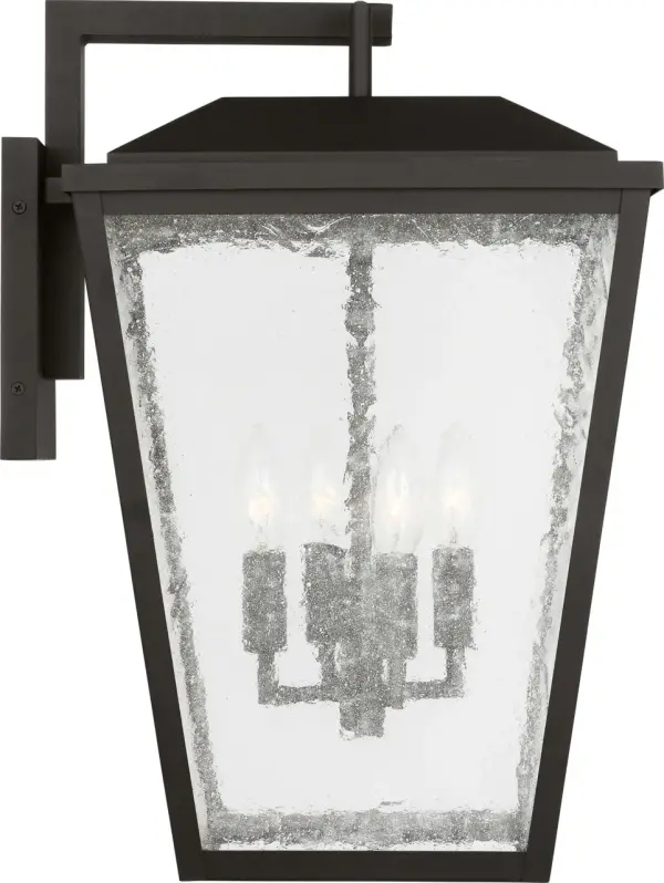 The Kennewick XL Wall Lantern makes a dramatic statement with its oversized proportions and textured black finish. Perfect for large outdoor spaces, this transitional design combines farmhouse charm with coastal elegance. - alternate view