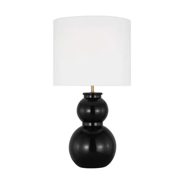 Drew & Jonathan Scott's Buckley reimagines the traditional gourd silhouette with clean, symmetrical lines and a glossy black finish. The white linen shade softens the bold base, creating a versatile accent piece that bridges traditional and contemporary interiors.