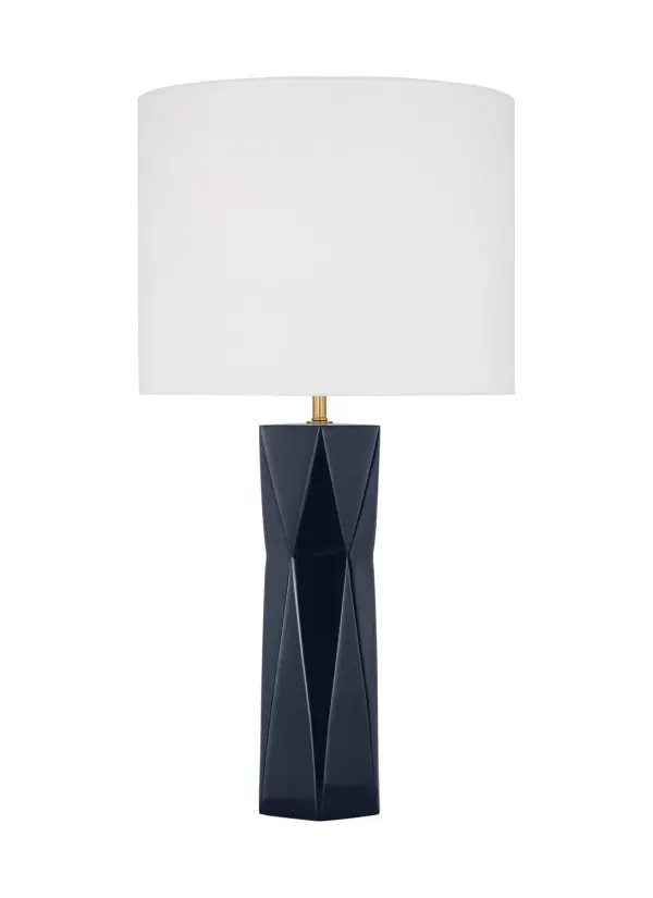 The Fernwood table lamp delivers sophisticated style with its textured navy column and gleaming gold base. Perfect for adding refined modern character to bedrooms and offices, it balances vintage-inspired design with contemporary functionality.