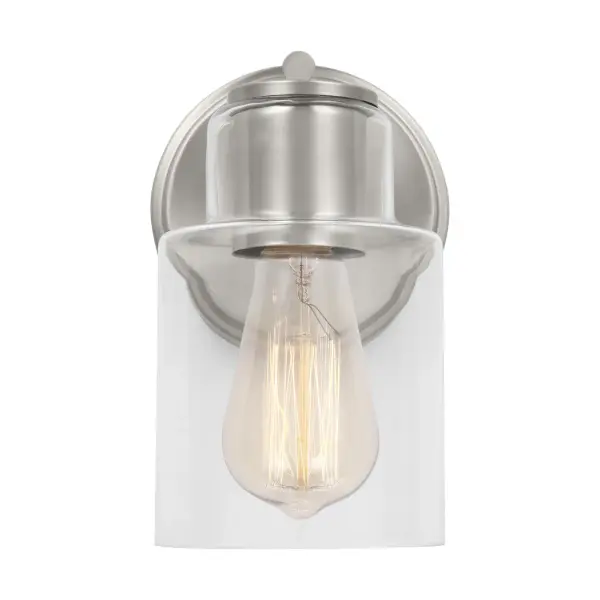 The Sayward sconce delivers clean, functional lighting with a timeless design that coordinates across multiple finishes. Its compact size and damp rating make it ideal for bathrooms, while the clear glass shade showcases decorative bulbs beautifully.