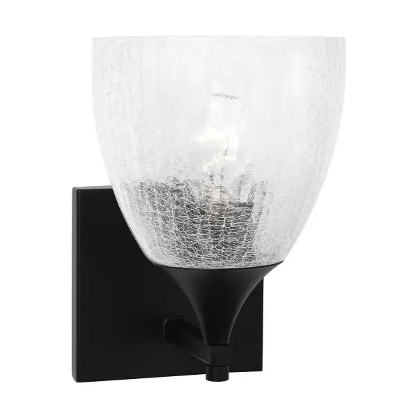 The Toffino wall sconce blends traditional form with modern finishes, featuring distinctive crackle glass and a sleek Midnight Black finish. Its reversible mounting and damp location rating make it highly adaptable.