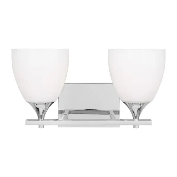 The Toffino brings fresh sophistication to bathroom lighting with milk glass shades and a sleek chrome finish. Its reversible mounting and damp location rating make it adaptable for various spaces beyond the bath.