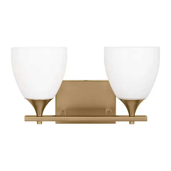 The Toffino brings fresh sophistication to bathroom lighting with its milk glass shades and warm satin brass finish. Reversible mounting and damp location rating make it adaptable for various spaces.