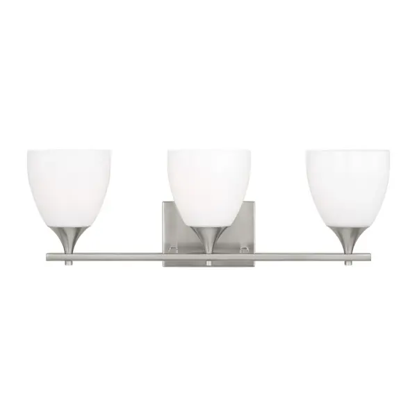 The Toffino brings fresh sophistication to bathroom lighting with its clean lines, milk glass shades, and brushed steel finish. Reversible mounting and damp location rating make it highly adaptable.