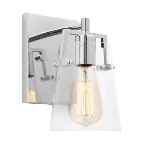 The Crofton wall sconce combines clean lines with practical functionality. Its reversible mounting and damp-rated certification make it ideal for bathrooms, while the clear glass shade beautifully showcases decorative filament bulbs.