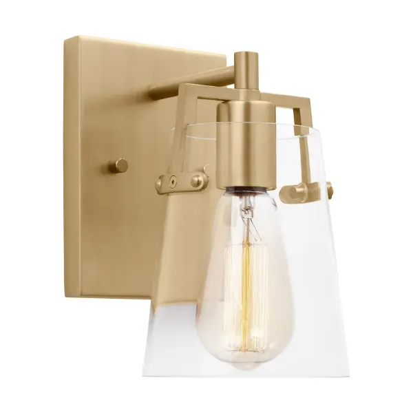 The Crofton sconce by Drew & Jonathan delivers clean-lined style with practical flexibility. Its reversible mounting and damp rating make it bathroom-ready, while the clear glass shade beautifully showcases vintage filament bulbs.