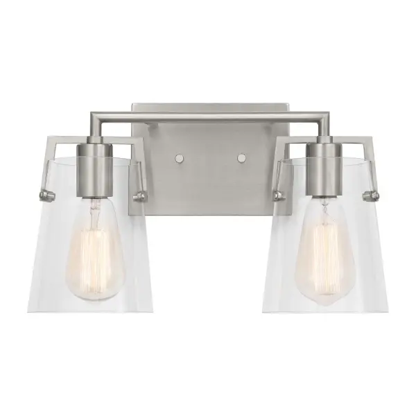 The Crofton by Drew & Jonathan delivers clean, functional lighting with a sleek rectangular backplate and clear glass shades. Its reversible mounting and damp rating make it practical for bathrooms, while the minimalist design coordinates across styles.