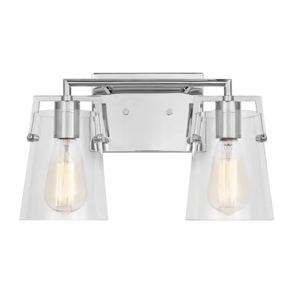 Drew & Jonathan's Crofton sconce delivers clean, functional lighting with transitional appeal. The chrome finish and clear glass shades work across multiple design styles, while reversible mounting adds flexibility.