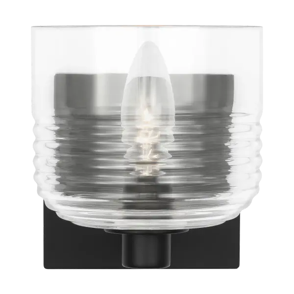 The Lochdale Small Sconce delivers sophisticated lighting in a compact form. Its Midnight Black finish provides timeless appeal that complements both traditional and contemporary interiors.