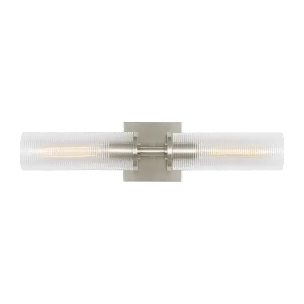 The Sarita Medium Sconce combines transitional design with a classic brushed nickel finish, making it an ideal choice for bathrooms, hallways, and bedrooms. Its medium size provides balanced illumination without overwhelming smaller spaces.