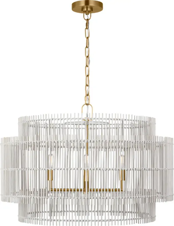 The Elio Large Hanging Shade combines natural bamboo texture with refined metalwork for a sophisticated organic modern aesthetic. Its intricate weave creates beautiful striated lighting patterns while the burnished brass finish adds warmth and elegance.
