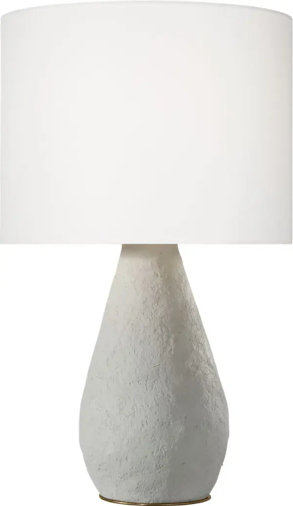 The Breccia Medium Table Lamp features a beautifully textured ceramic base with a cream wash finish that brings natural, organic elegance to any space. Its medium size makes it versatile for bedrooms, living areas, and offices. - alternate view