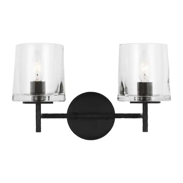 The Marietta vanity fixture combines industrial authenticity with mid-century sophistication. Its hammered Aged Iron finish and mouth-blown clear glass create visual interest while maintaining timeless appeal.