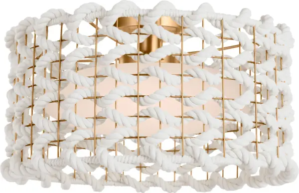 The Catania flush mount combines warm antique brass with handcrafted cream woven rope for a sophisticated coastal aesthetic. Its 17-inch diameter provides ample illumination while the low-profile design suits standard ceiling heights.