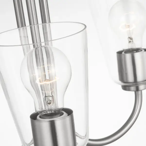 The Miles Small Chandelier delivers gentle, diffused lighting through etched glass shades in a compact three-light design. Its brushed nickel finish and transitional styling make it adaptable to various interior aesthetics. - alternate view