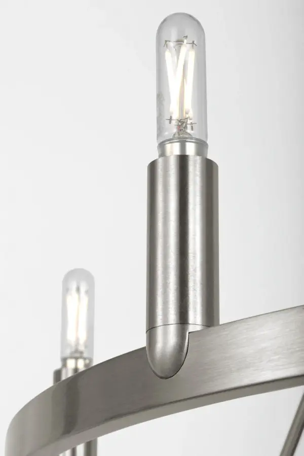 The Mirla Ring Chandelier combines minimalist geometry with candelabra-style lighting for a balanced, contemporary look. Its circular silhouette and exposed lamping create ambient glow while maintaining architectural clarity across various interior styles. - alternate view