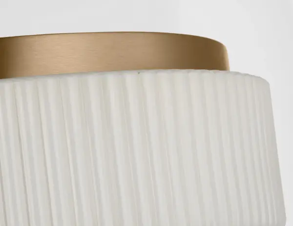 The Axira combines decorative ribbed glass with a slim satin brass band for a refined look that works across traditional, transitional, and contemporary interiors. Its compact scale and softened glow make it ideal for hallways, bedrooms, and entryways. - alternate view