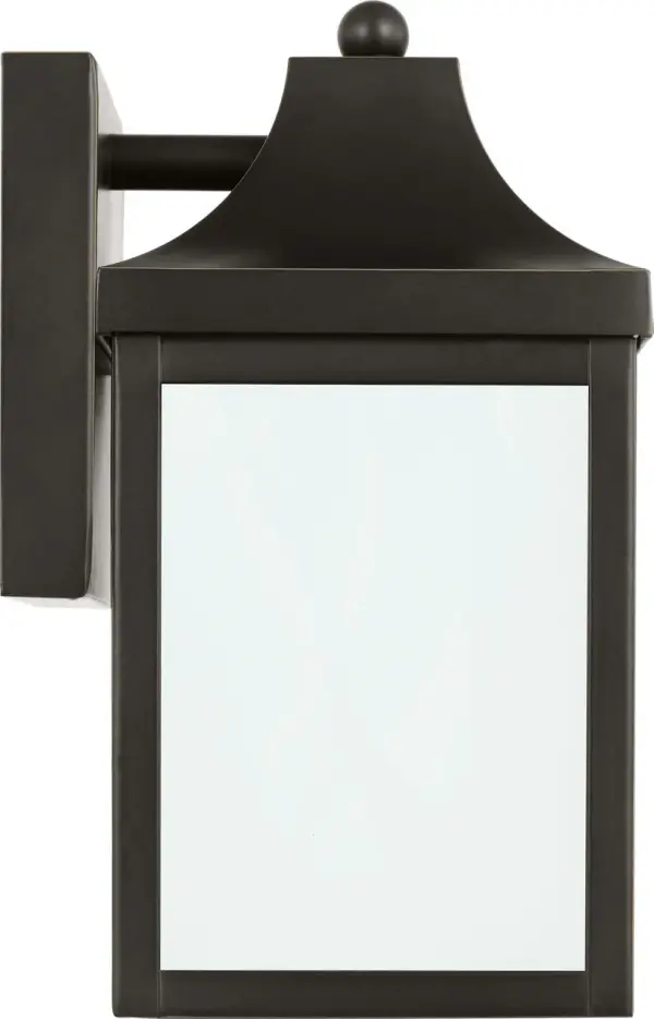 The Saybrook Extra Small Wall Lantern delivers traditional charm in a compact footprint. Its antique bronze finish and clear glass panels create timeless appeal for entryways, porches, and intimate outdoor areas. - alternate view