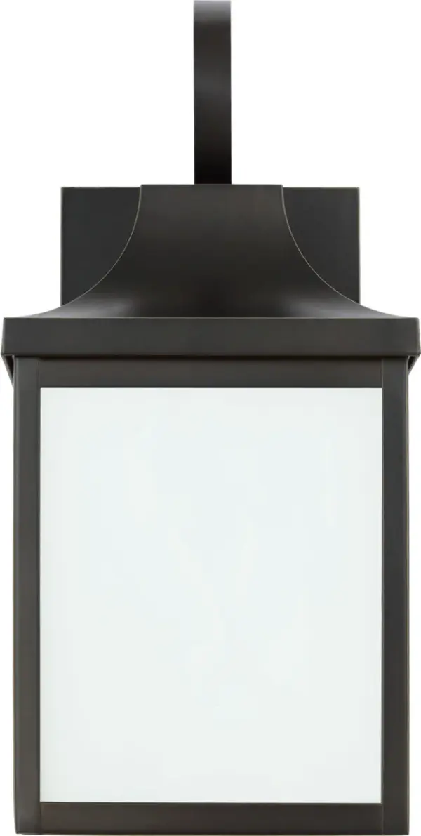 The Saybrook Small Wall Lantern delivers traditional charm in a compact footprint, perfect for flanking doorways or illuminating smaller outdoor spaces. Its antique bronze finish and clear glass panels create welcoming ambiance.