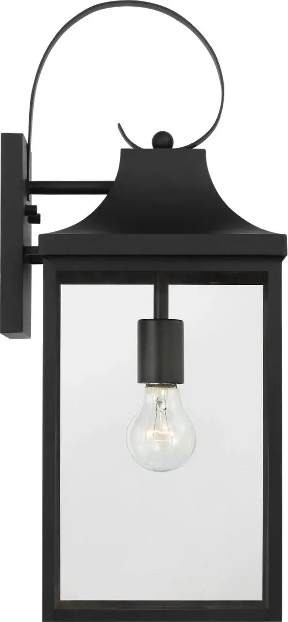 The Saybrook Large Wall Lantern combines traditional design with durable outdoor construction. Its textured black finish and clear glass panels create a welcoming ambiance for entryways and outdoor spaces.