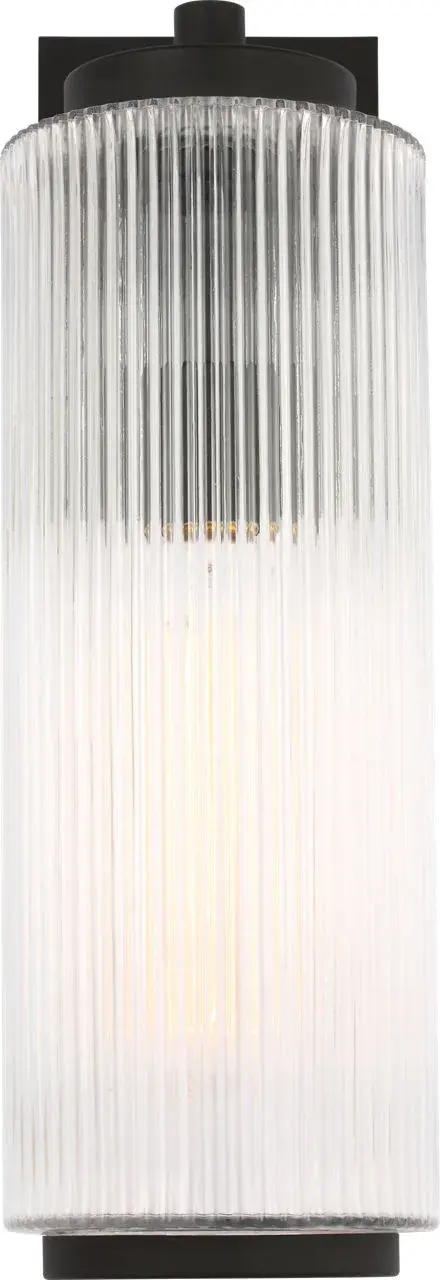 The Ronde Large Wall Lantern combines vertical ribbed glass with a sleek metal frame in Textured Black. Wet-rated for durability and available with Dark Sky accessories, it's ideal for patios, porches, and entryways. - alternate view