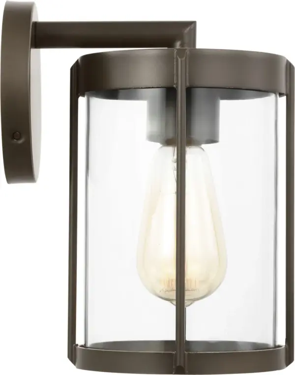 The Luning Small Lantern delivers industrial-inspired style in a scaled-down form, perfect for narrow entries, walkways, and secondary exterior placements. Clear glass provides targeted illumination while the antique bronze finish adds timeless appeal. - alternate view