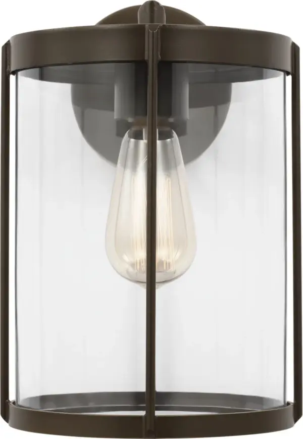 The Luning Medium Lantern combines traditional design with practical outdoor performance. Its cylindrical clear glass diffuser and proportioned metal frame deliver reliable illumination for entryways and pathways.