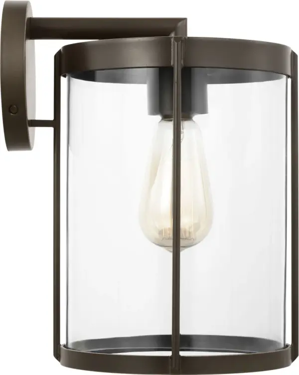 The Luning Medium Lantern combines traditional design with practical outdoor performance. Its cylindrical clear glass diffuser and proportioned metal frame deliver reliable illumination for entryways and pathways. - alternate view