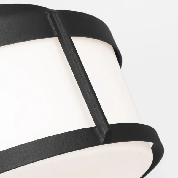 The Luning Medium Flush Mount combines geometric simplicity with practical functionality. Its wet-rated construction and compact profile make it ideal for covered outdoor areas while the opal etched glass provides soft, functional downlight. - alternate view