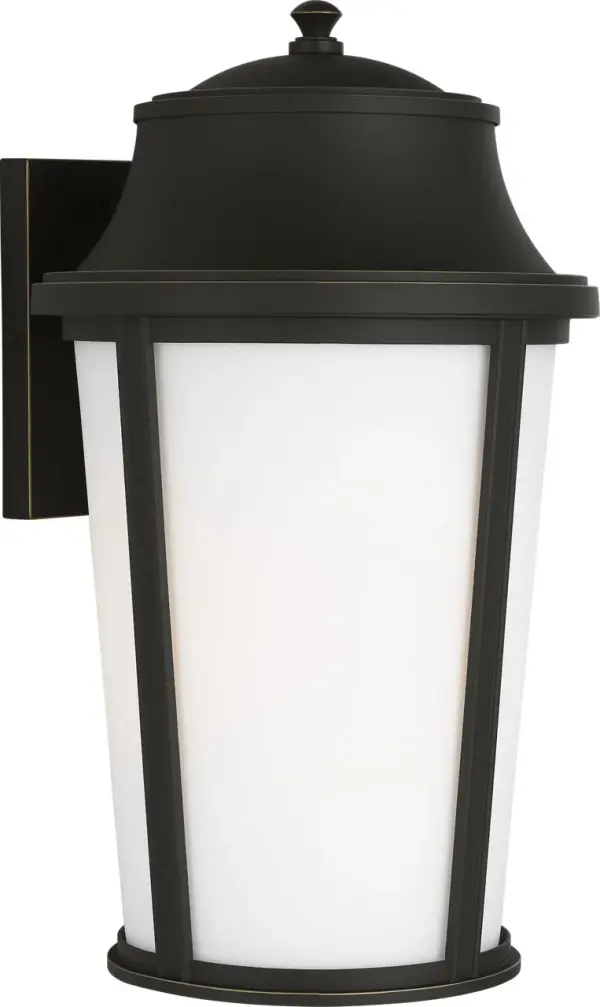 The Portola Large Lantern elevates outdoor spaces with its softened traditional silhouette and etched glass diffusion. Wet-rated durability meets timeless design, making it ideal for porches and entryways seeking elegant ambiance.