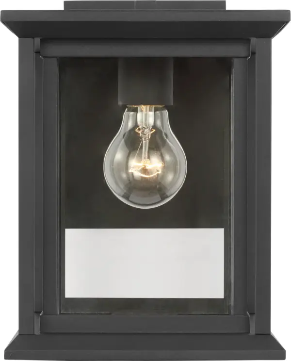 The Audley Small Wall Lantern delivers classic lantern styling in a space-conscious design. Its textured black finish and clear glass enclosure create timeless appeal for narrow entries, columns, or secondary outdoor walls.