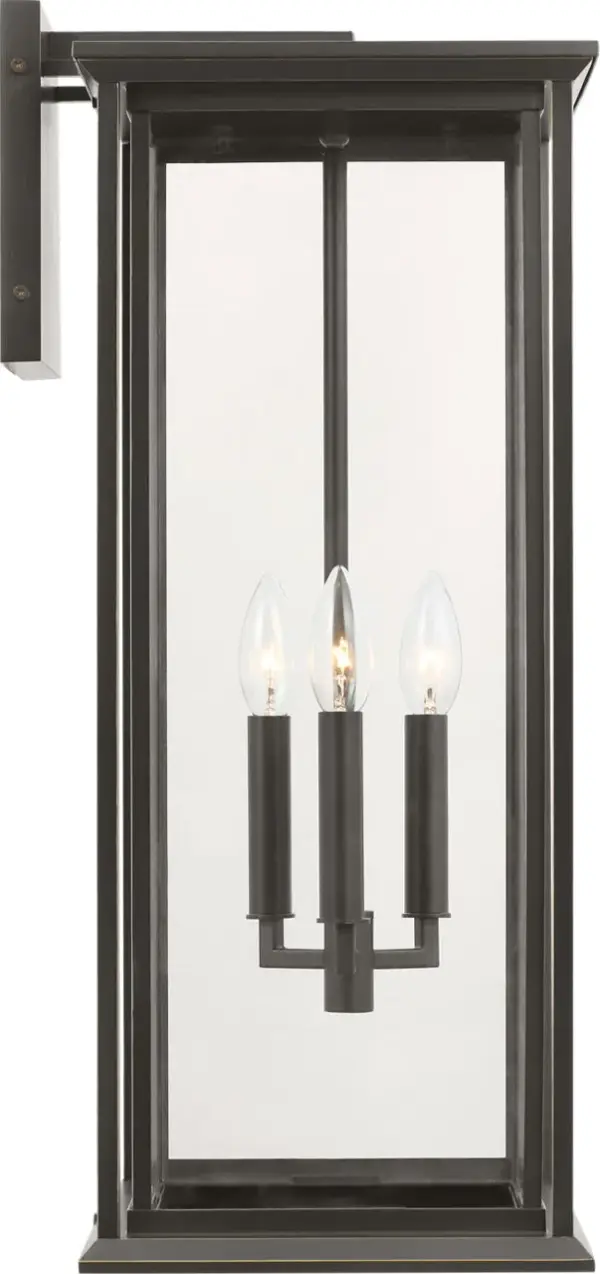 The Audley Extra Large Lantern combines clean-lined metal framing with clear glass panels for a sophisticated outdoor lighting solution. Weather-resistant and wet-rated for durability, it scales beautifully for large facades.